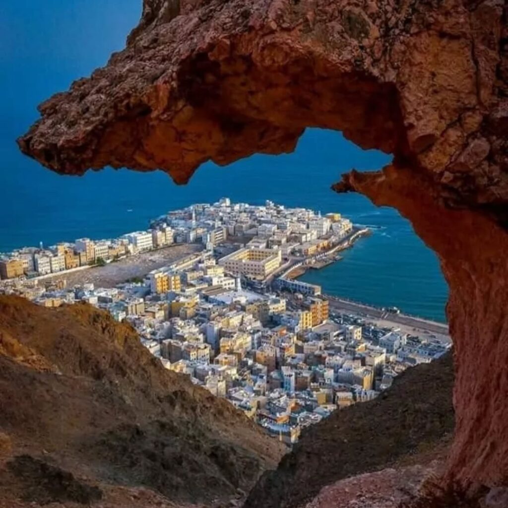 A natural rocky window view overlooking the historic neighborhoods of Al Mukalla