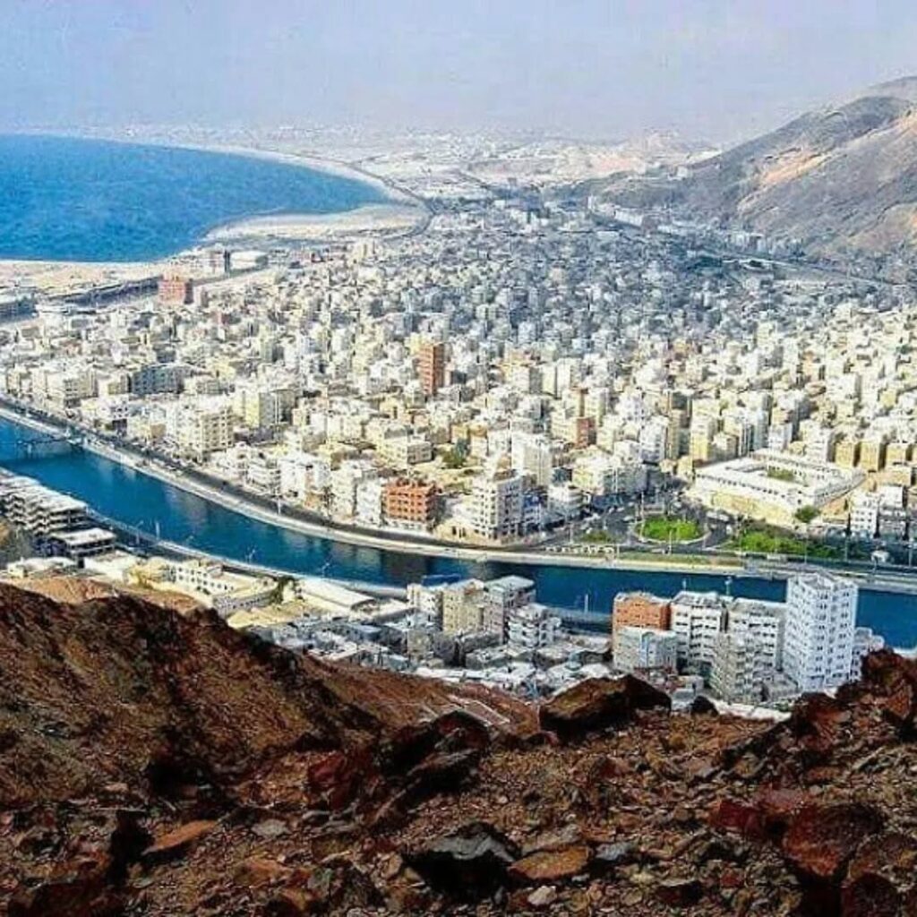 Urban expansion of Al Mukalla city nestled between mountains and the sea