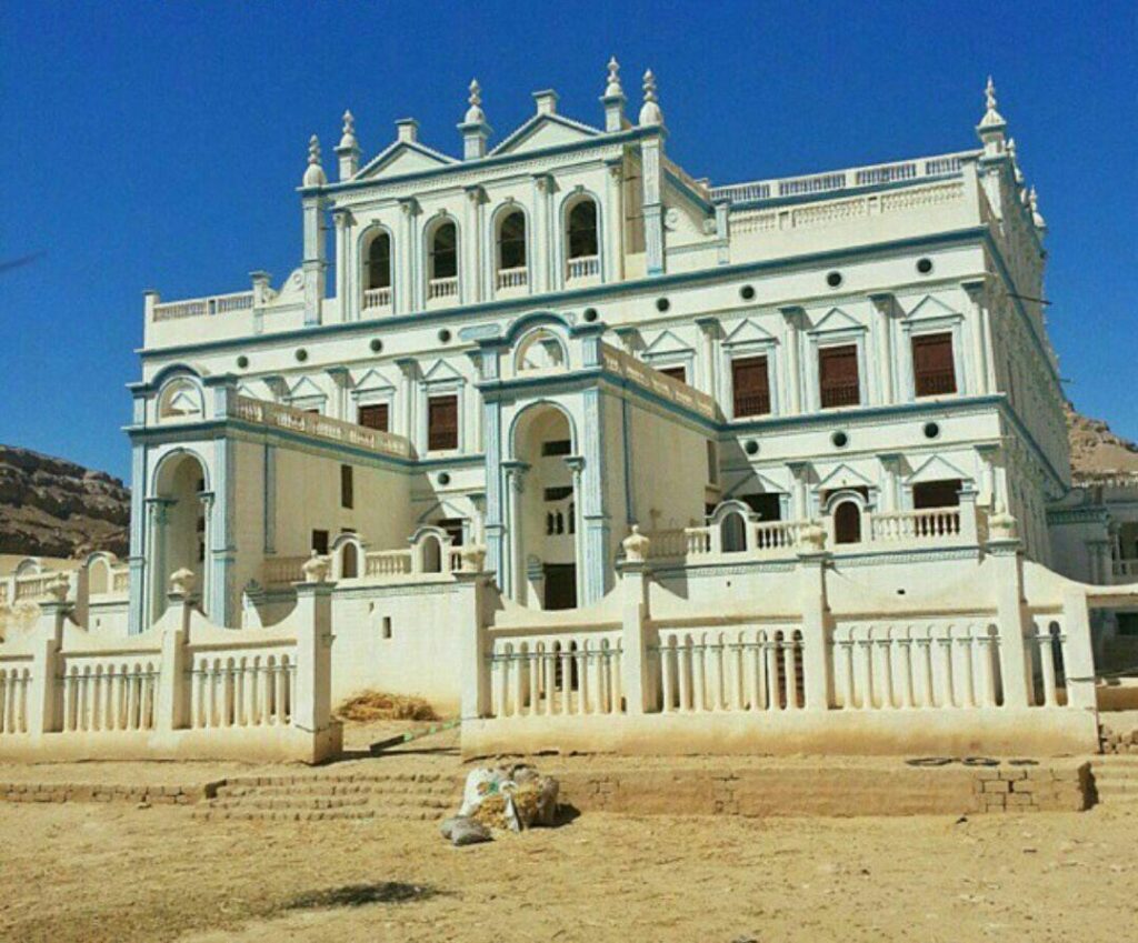 Unique Tarim City historical architecture featuring a grand white palace with traditional Yemeni and Southeast Asian influences.